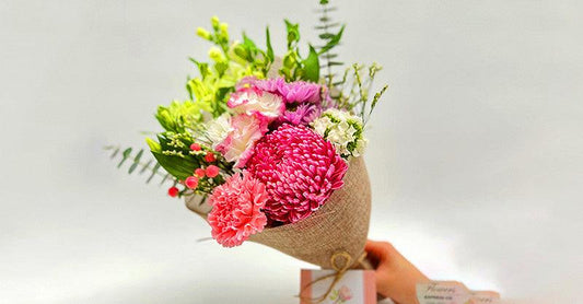 Beautiful daily blooms bouquet in glass vase