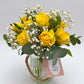 10 stems of yellow roses in a glass jar, delivery in Melbourne.
