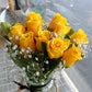 A bouquet of 10 yellow roses arranged in a glass jar, to be delivered in Melbourne.